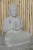  Product image 3 of the product “Seated Buddha with floral carving, Dharmacakra position. 67 cm height. Natural stone (river stone), stonemasonry. There is a stone eye in the chest. ”